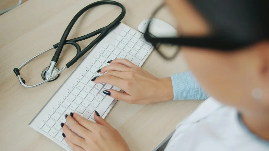 Medical professional at a keyboard, coordinated SERP attack case study